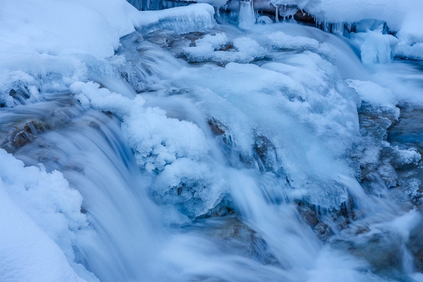 Half frozen waterfall in Banff National Park Canada 
