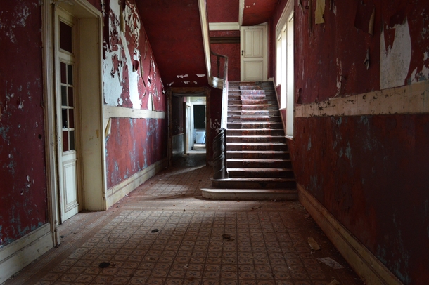 Hall in an abandoned mansion Chateau Rouge 