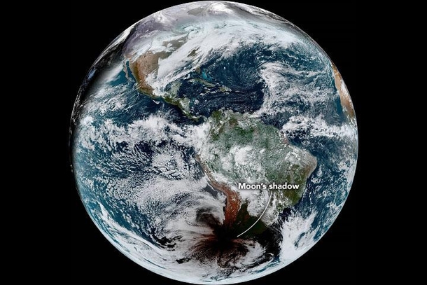 Here is a photo of the earth The big dark spot you see is the shadow of the moon during the eclipse of December  