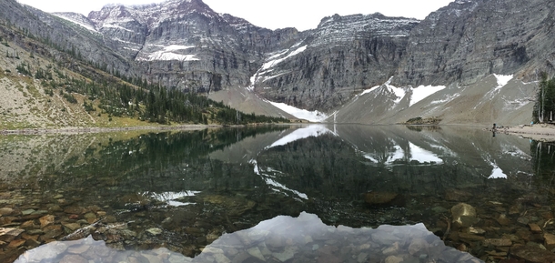 Hiked  miles through a valley and through a cave to Crypt Lake for this amazingly reflective shot 