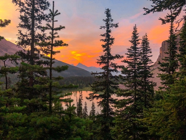 Hiking out to Rockbound Lake to watch the sunrise from the middle of Castle Mountain we turned back to see this amazing scene over Tower Lake Ab 