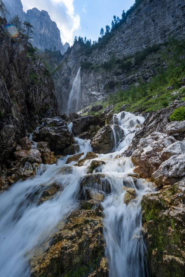 Hiking up a Stream to a Beautiful Waterfall in the Italian Alps 