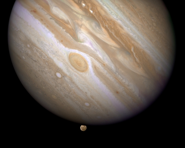 Hubble image of Ganymede is shown just before it ducks behind The Giant Planet 