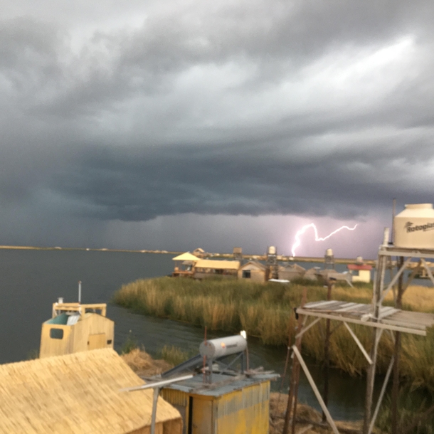 I dont know if this is acceptable in this subreddit but I caught a pretty amazing snap of lightning while staying on a floating island on Lake Titicaca Peru