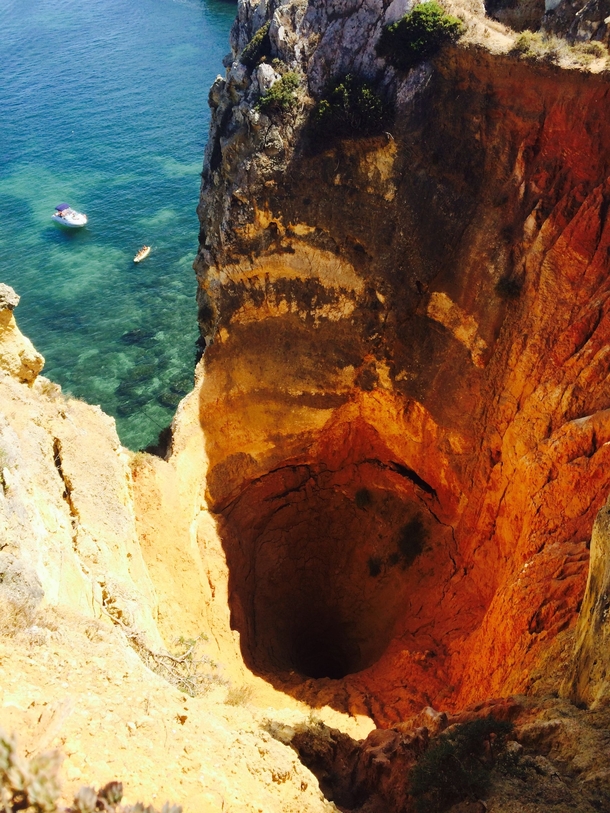 I stumbled upon this beautiful abyss while hiking near Lagos Portugal 