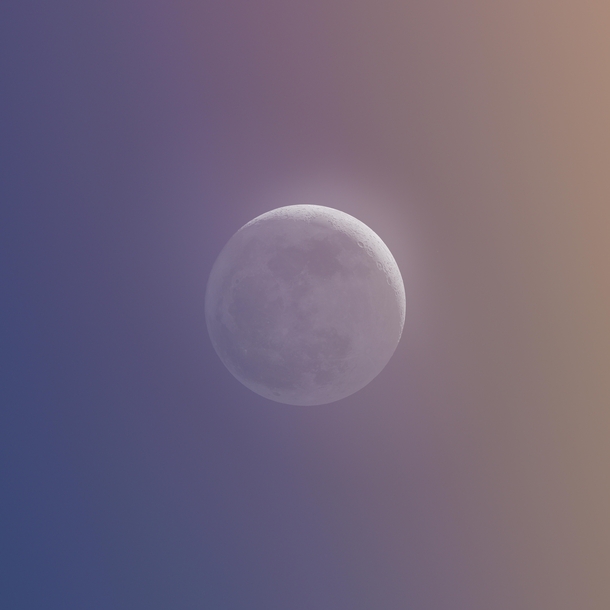 I took a shot of the moon through last nights sunset 