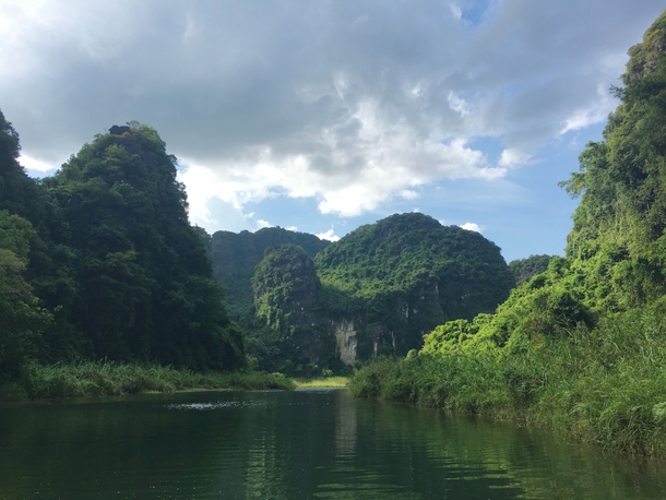 I visited Trng An in Ninh Binh Vietnam last summer and floated through the mountains 