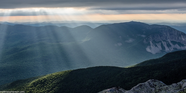 I was lucky enough to capture sunbeams breaking through cloud cover onto Franconia Notch in New Hampshire 