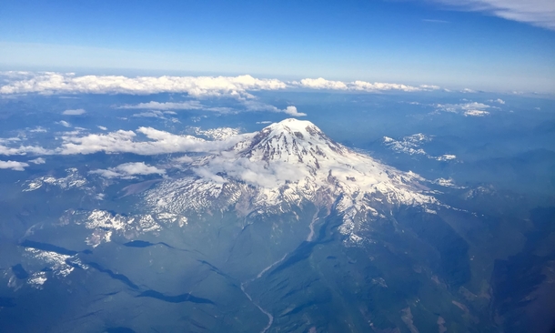 I was on the wrong side of the plane to see Mt Rainier but my GF shot this 