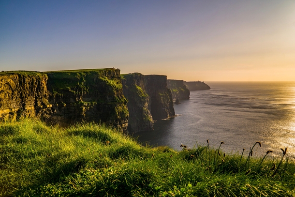 I went on a trip to Ireland last year I took this photo at the Cliffs of Moher at sunset It was stormy af that day but the view was great 