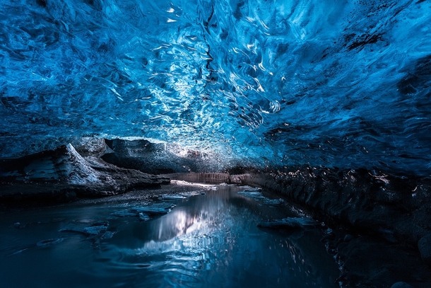 Ice cave with ice crystals Under the Vatnajkull Iceland  by Herv Loire