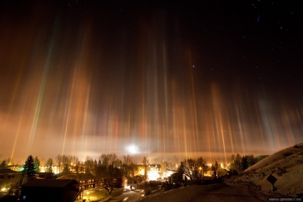 Ice crystals in the air creating pillars of light over Jackson Wyoming 