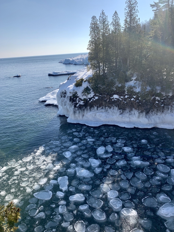 Ice pods gather during a mid winter melt Lake Superior Michigan 