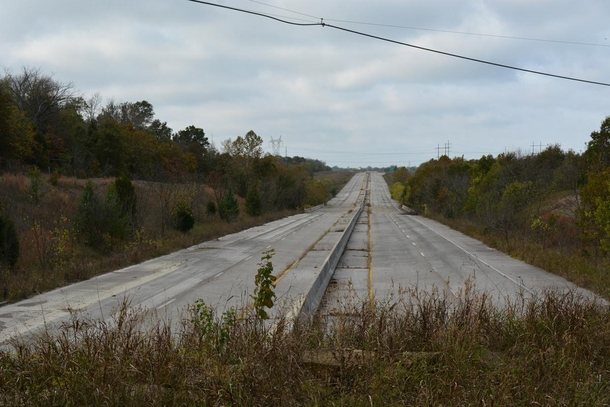 In  Interstate  in Oklahoma was realigned to join up with the new Creek Turnpike east of Tulsa As a result almost two miles of the original four-lane Will Rogers Turnpike was deserted but remains visible today