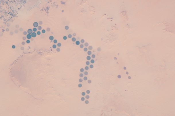 In the s Libya launched a great cultivation project aimed at developing agriculture in the desert seen from ISS 