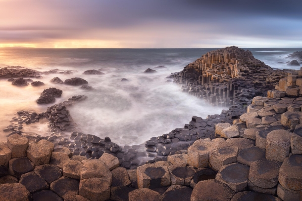 In the Wake Of Poseidon Panorama of Giant Causeway in the Evening Northern Ireland United Kingdom  by ansharphoto