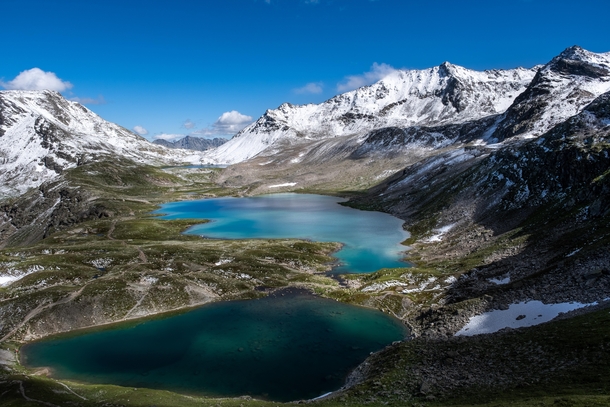 Incredible colours of glacial lakes in Switzerland after the first snowfall Jriseen Graubnden 