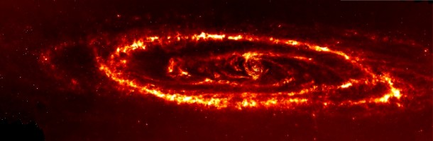 Infrared image of the Andromeda Galaxy  The hole on the bottom right is thought to have been caused by a violent collision with the dwarf galaxy M  mya 