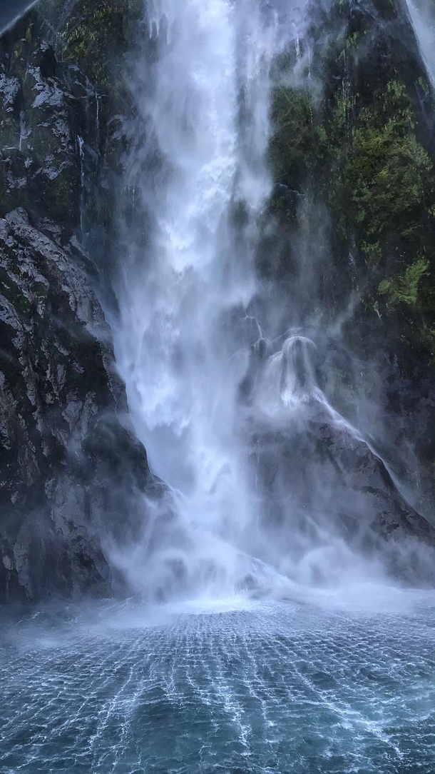 Inside a waterfall at Milford Sound NZ 