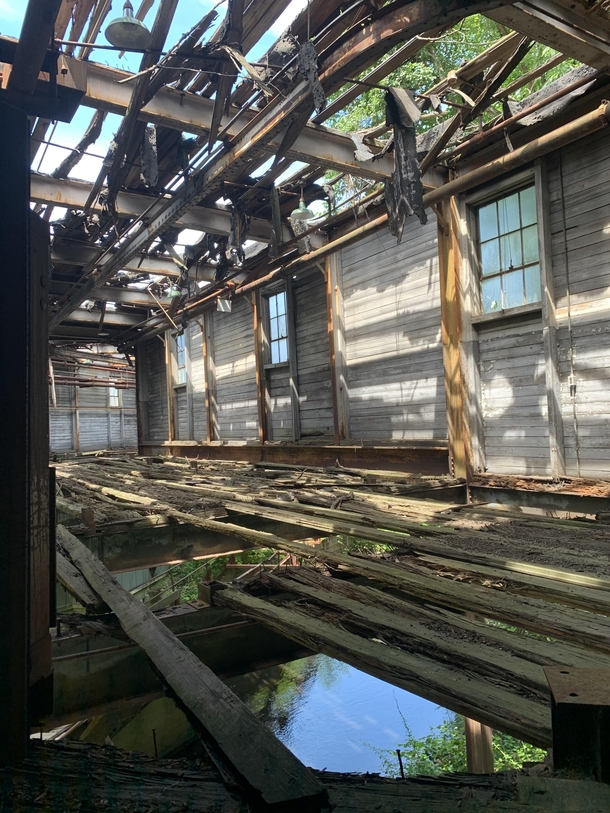 Inside an abandoned mill along some train tracks