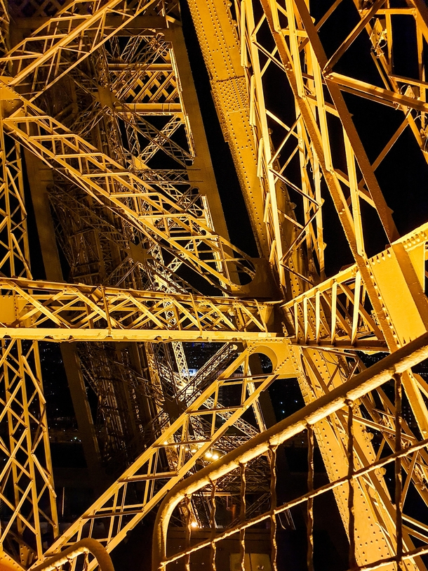 Inside the Eiffel Tower at night Gustave Eiffel 