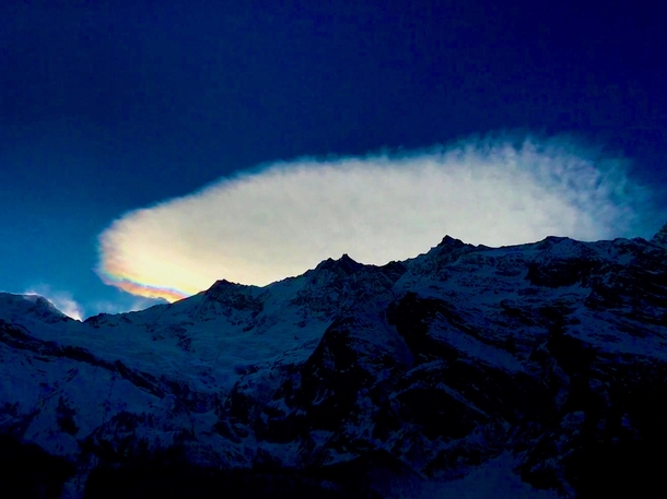 Interesting cloud formation surrounding Switzerlands highest peak The Dom m OC   