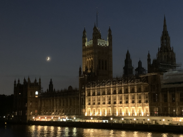 It may only be shot on my iPhone but I do love this picture I stopped to take tonight of the Moon and a very faint Jupiter setting above the Palace of Westminster UK Parliament