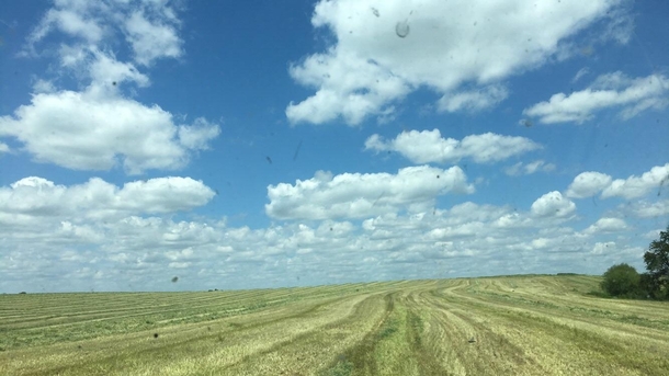 ITAP of clouds so perfect they look fake Dont mind the dirty tractor window NW Missouri x 