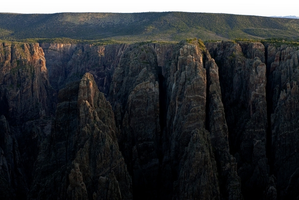Its tough to capture the immense scale of this place but Black Canyon of the Gunnison in Colorado is a GIANT whole in the ground 