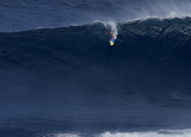 Jeff Rowley rides the Jaws wave Maui HI photo by Shacktown 