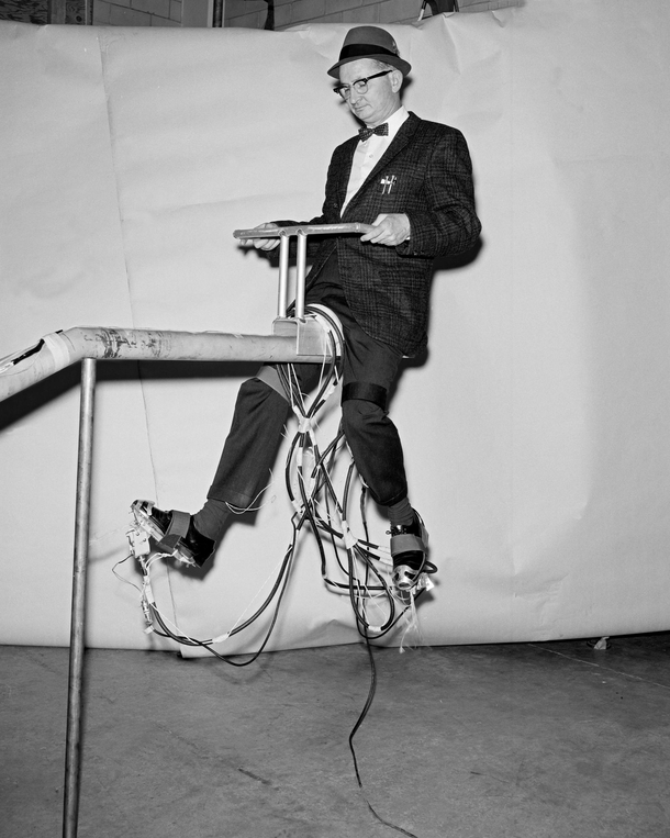 John D Bird with a prototype for jet-propelled shoes at the NASA Langley Research Center in Hampton Virginia 