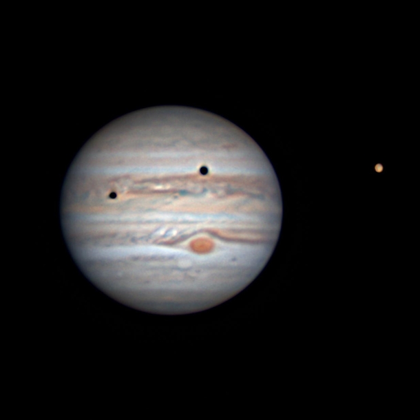 Jupiter had a double eclipse this weekend Heres the picture I snapped from my backyard in northern California Ganymede is on the right Io is hiding among the clouds