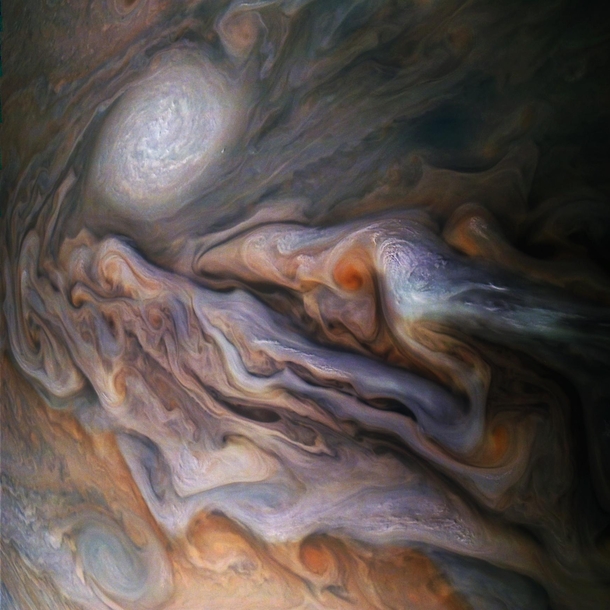 Jupiters Magnificent Swirling Clouds color-enhanced CreditNASA