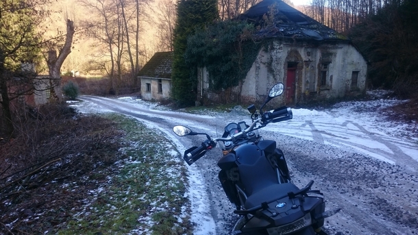 Just found this sub and thought Id share this entrance building to an abandoned German explosives factory Excuse the motorcycle I didnt think Id ever post it online
