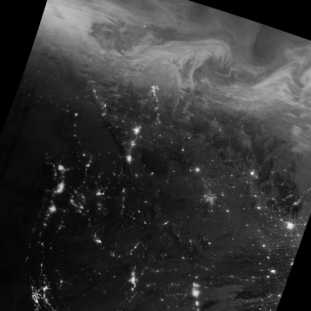 Just hours after the winter solstice a mass of energetic particles from the Sun smashed into the magnetic field around Earth The strong solar wind stream stirred up a display of northern lights over northern Canada 
