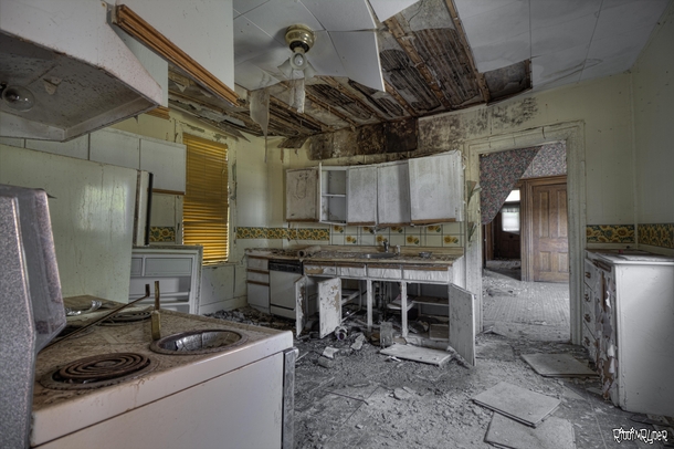 Kitchen Inside A Beautiful Abandoned Red Brick House in The Country 