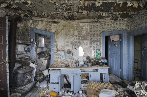 Kitchen Inside an Abandoned House that is Falling in on itself 