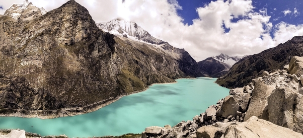 Laguna Parn in Huascaran National Park Peru The mountain at the end of the lake hidden due to clouds was the inspiration for the Paramount logo 