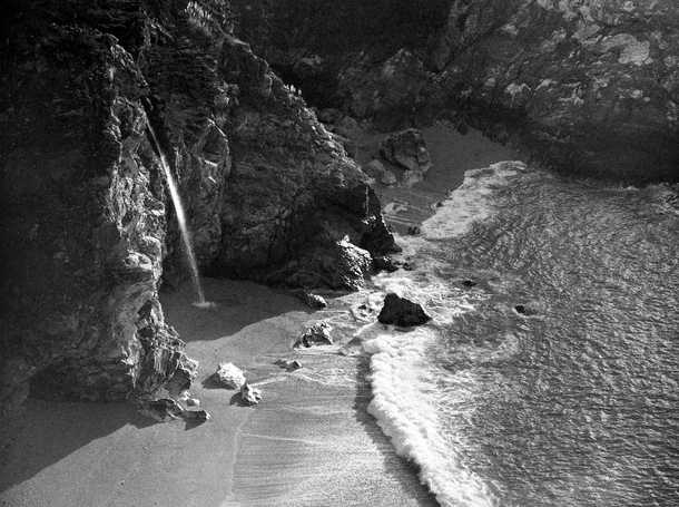 Late afternoon light at McWay Falls in Julia Pfeiffer State Park Big Sur CA Shot on black and white film 