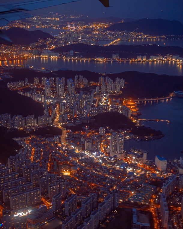 Layers of cityscape and nature seen from the air Busan South Korea 