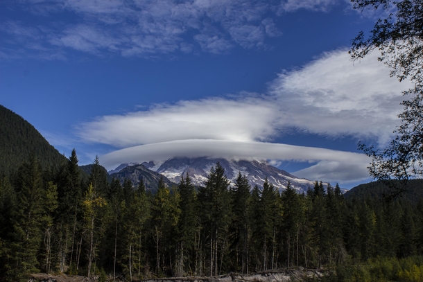 Lenticular clouds form a halo around Mt Rainier 