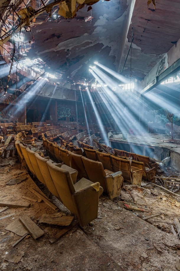 Light shining into an abandoned theater