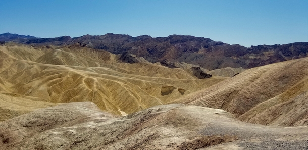 Like a water color palette spilling on the ground nothing quite like the landscapes of Death Valley CA OC 