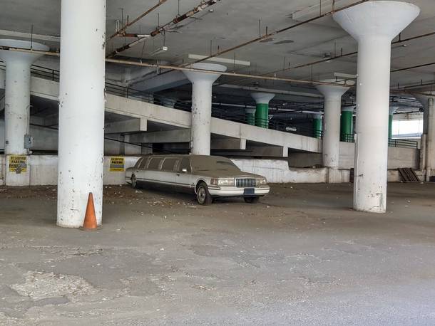Limo in an abandoned garage in Hartford CT Hasnt moved in the  years Ive been walking past it No clue how long its actually been sitting