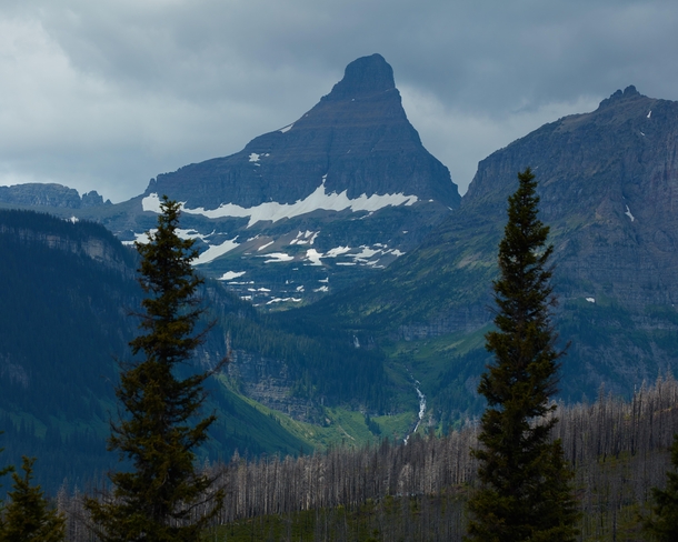 Lining up this massive peak and waterfall at Glacier National Park 