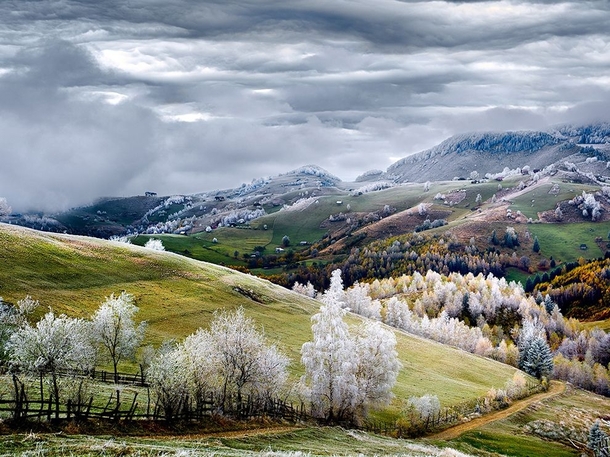 Lofty Frost over the village of Petera RomaniaPhotograph by Eduard Gutescu