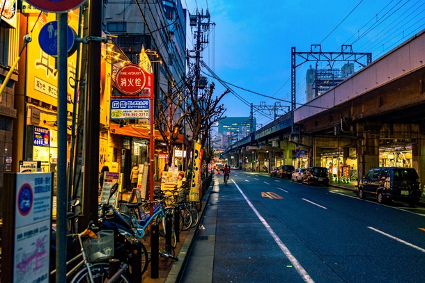 Lonely Street in Kobe Japan by Alberto Sanchez 