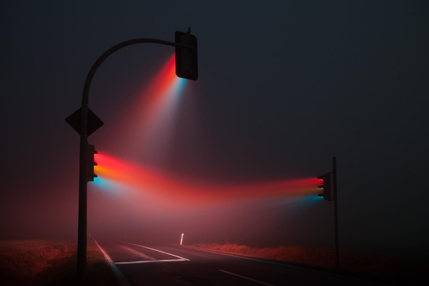 Long exposure of traffic signals apparently in fog 
