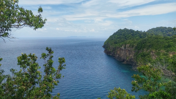 Looking off the side of a cliff on Ko Rok island in Thailand 