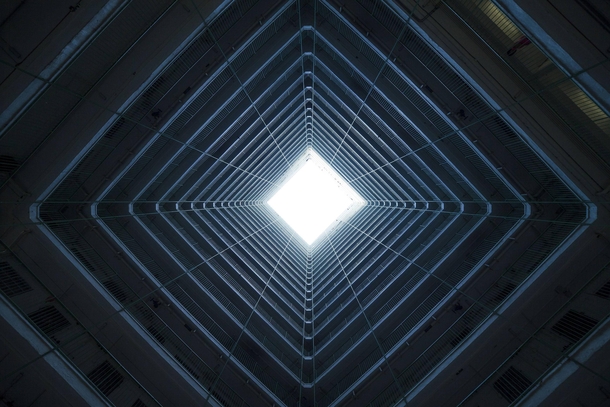 Looking up inside a block of apartments in Hong Kong 